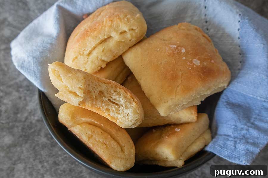 Top Gluten-Free Rolls & Buns: Soft, Fluffy Recipes You’ll Love 5 Buttery, folded, and fluffy gluten-free Parker House rolls, puffed up, soft, in a bowl.