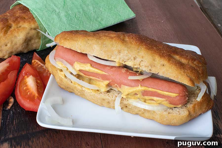 Top Gluten-Free Rolls & Buns: Soft, Fluffy Recipes You’ll Love 7 Soft, delicious homemade gluten-free hot dog bun filled with hot dog on a plate