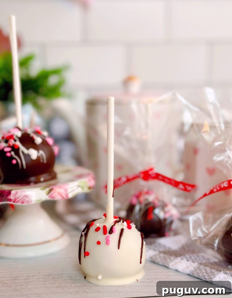 Red Velvet Cake Pops: Bite-Sized Dessert Recipe Guide 9 Dipped cake pops.