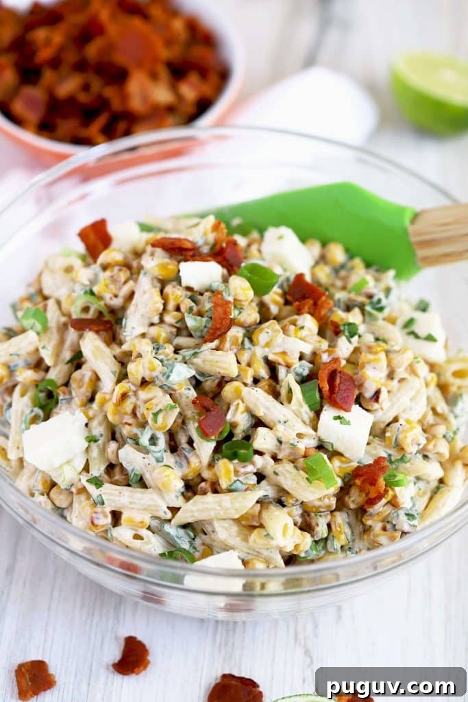 Mexican Street Corn Pasta Salad Recipe with Chili-Lime Dressing 10 Mexican Street corn pasta salad with bacon on top
