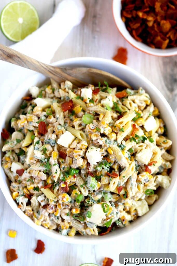 Mexican Street Corn Pasta Salad Recipe with Chili-Lime Dressing 11 Top view of this easy pasta salad served in a white bowl