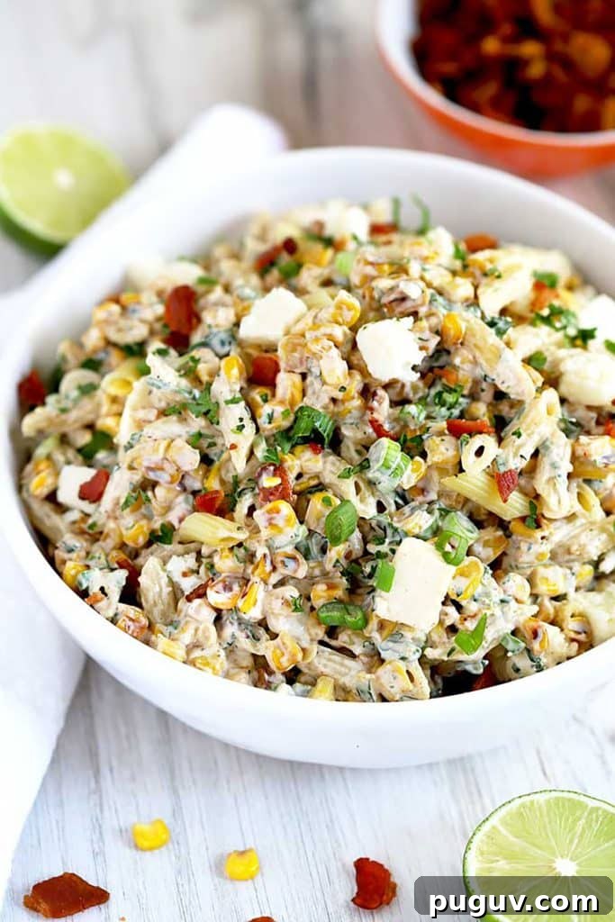 Mexican Street Corn Pasta Salad Recipe with Chili-Lime Dressing 3 Mexican Pasta Salad served in a bowl.
