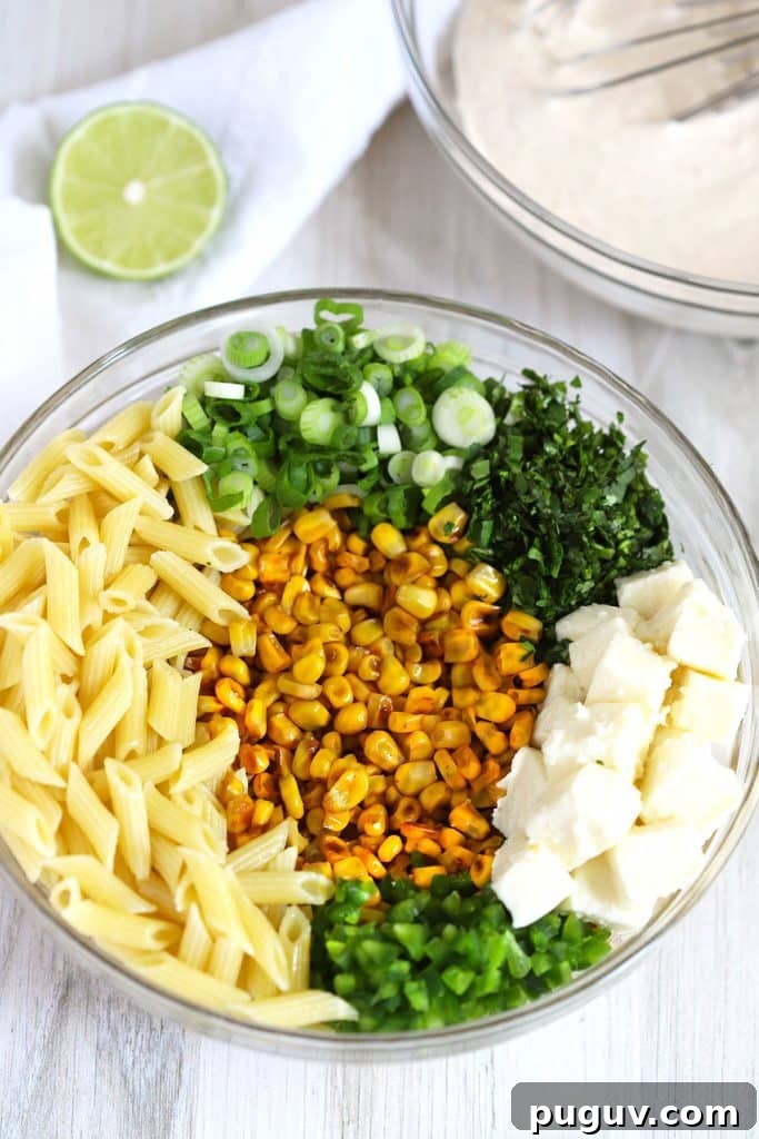 Mexican Street Corn Pasta Salad Recipe with Chili-Lime Dressing 7 ingredients to make the Mexican Street corn salad in a bowl