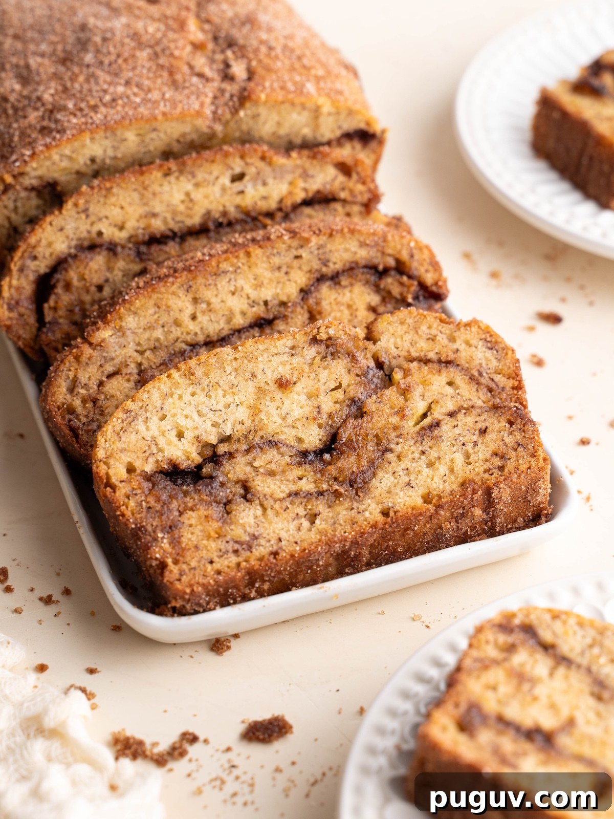 Cinnamon Swirl Banana Bread Recipe with Brown Sugar Swirl 2 Cinnamon swirl banana bread sliced on plates