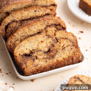 Cinnamon Swirl Banana Bread Recipe with Brown Sugar Swirl 11 Cinnamon swirl banana bread sliced on plates