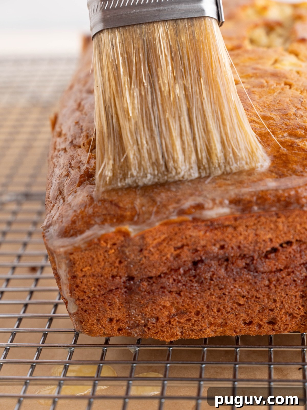 Cinnamon Swirl Banana Bread Recipe with Brown Sugar Swirl 7 Brushing quick bread with melted butter