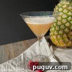 How to Make a Classic French Martini Cocktail 13 French martini cocktail next to a pineapple