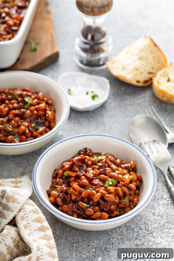 Classic Homemade Baked Beans Recipe for Oven-Baked Flavor 3 Bowls filled with Barbecue Baked Beans