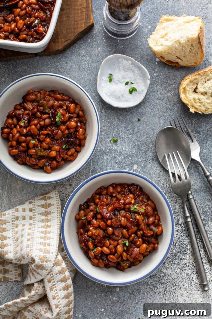 Classic Homemade Baked Beans Recipe for Oven-Baked Flavor 7 Bowls filled with the best baked beans.