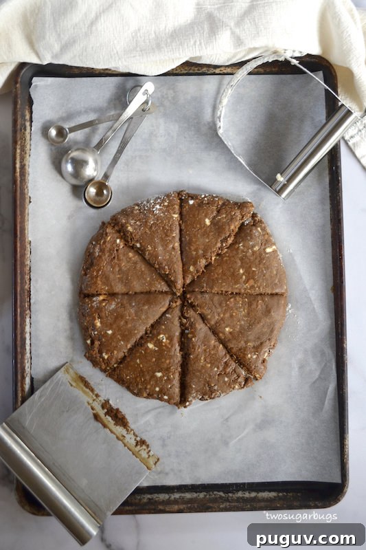 unbaked gingerbread scone dough on a baking sheet