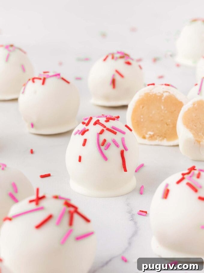 Valentine Sugar Cookie Truffles: Creamy Heart-Shaped Dessert Bites 6 sugar cookie Valentine truffles with red and pink sprinkles