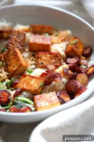 Baked Chili Garlic Tofu, Carrot, Chard and Noodle Bowls. Easy Weeknight Meal. Add some toasted cashews and other veggies of choice. #Glutenfree Nut-free #Vegan #Recipe #veganricha | VeganRicha.com 