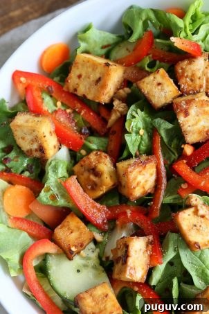 45 Tofu Recipes: Stir-Fries, Marinades, Curries, Sandwiches & More 14 Crunchy Asian Salad With Baked Tofu & Garlic Soy Maple Dressing. Marinated and Baked Tofu over Crunchy Greens, peppers and carrots. Vegan Gluten-free Recipe | VeganRicha.com
