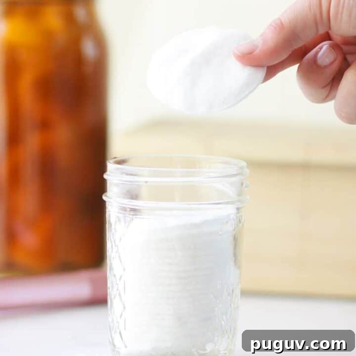 a jelly jar with makeup remover wipes in it