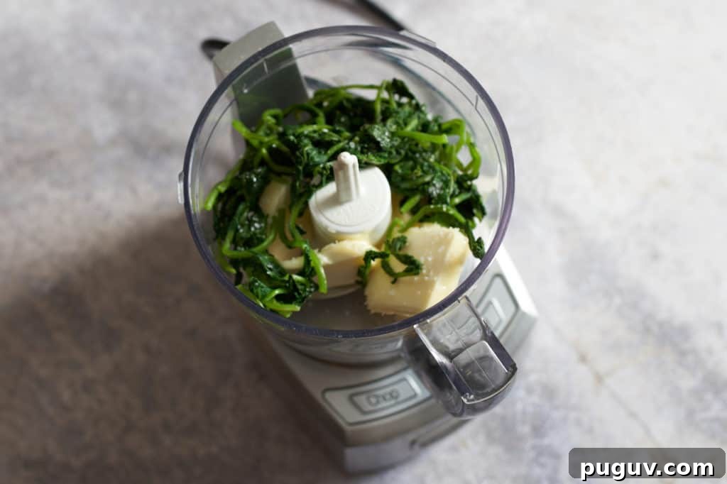 Blanched radish leaves and butter in a food processor.