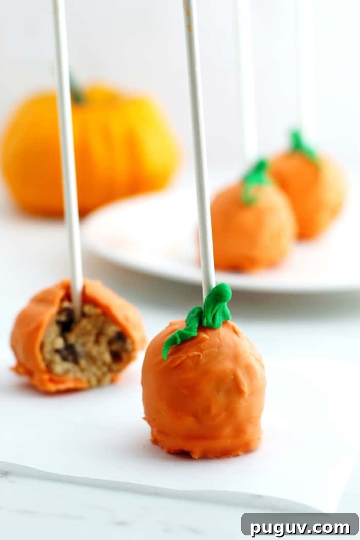 No-Bake Pumpkin Cookie Dough Pops — Fall Dessert Bites 3 Pumpkin pops are a perfect treat for a Halloween party. These pumpkin-shaped cookie dough pops are easy to make, no oven necessary!
