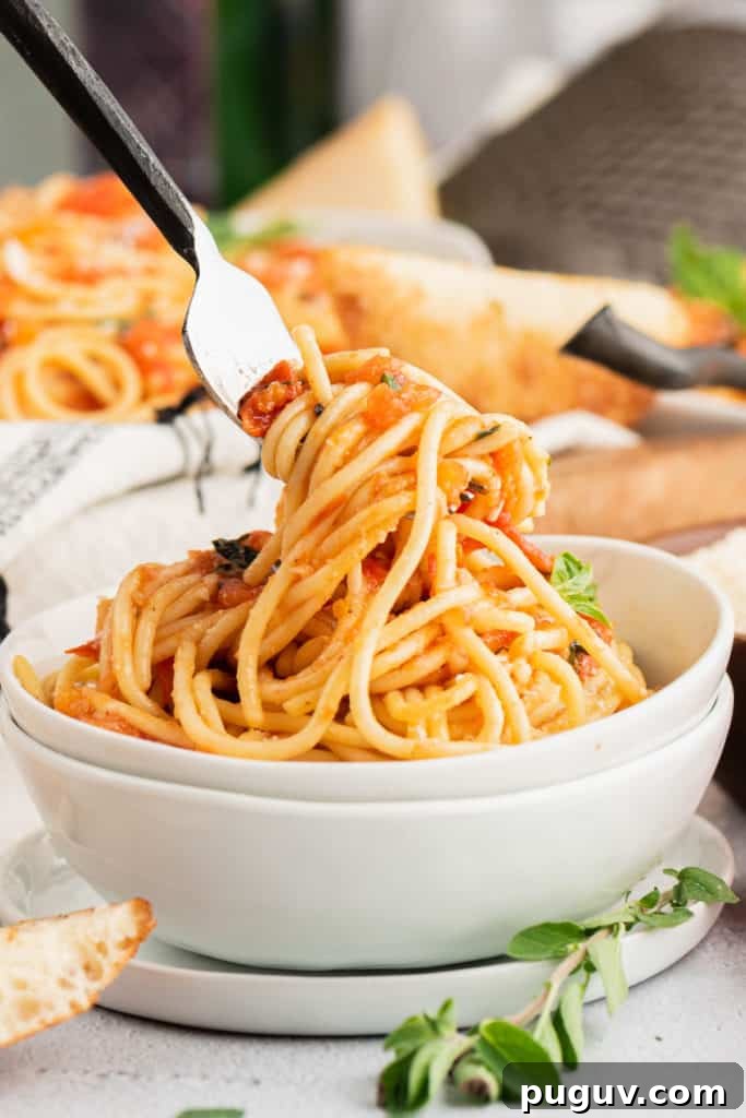 Perfect Pairings for Bruschetta: Appetizers, Salads & Wines 8 Fork lifting up pasta from a bowl.
