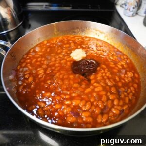 Classic Oven-Baked Beans Recipe with Step-by-Step Video 10 Baked beans with mustard, bbq sauce and molasses.