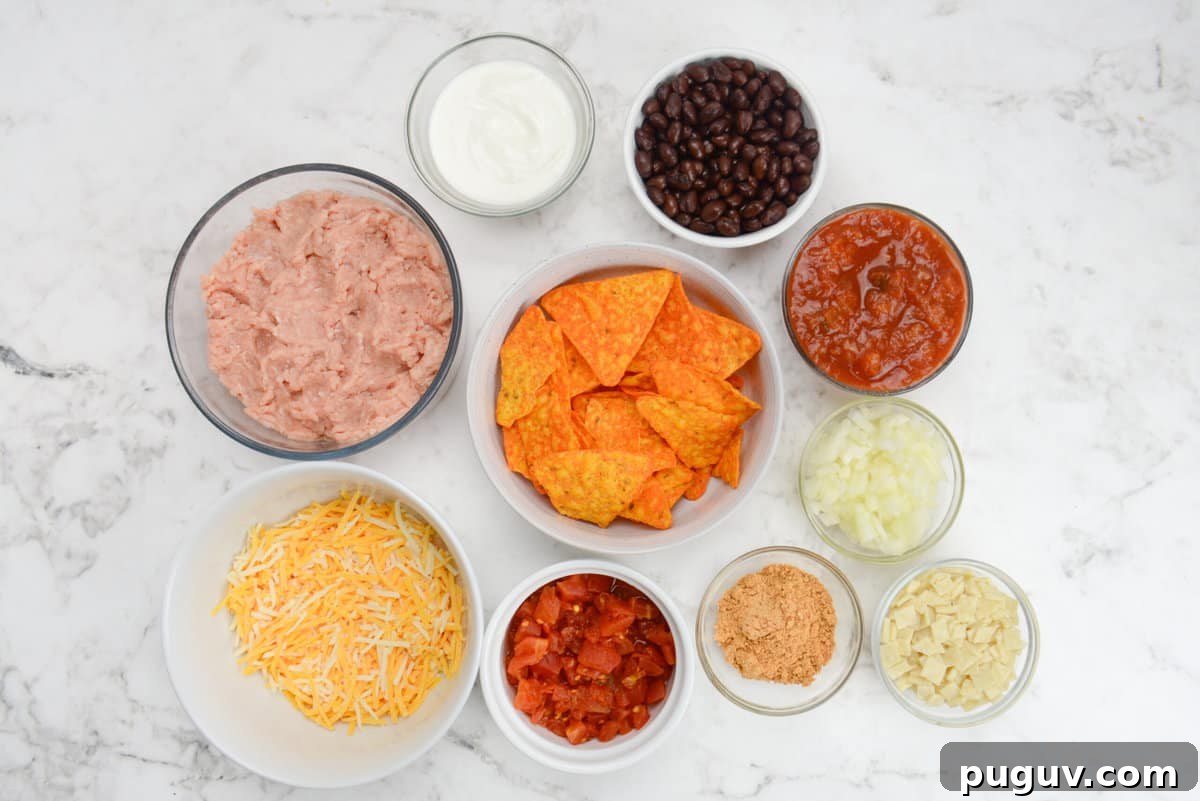 Doritos Casserole Recipe with WW SmartPoints and Tips 3 A variety of bowls filled with the casserole ingredients.