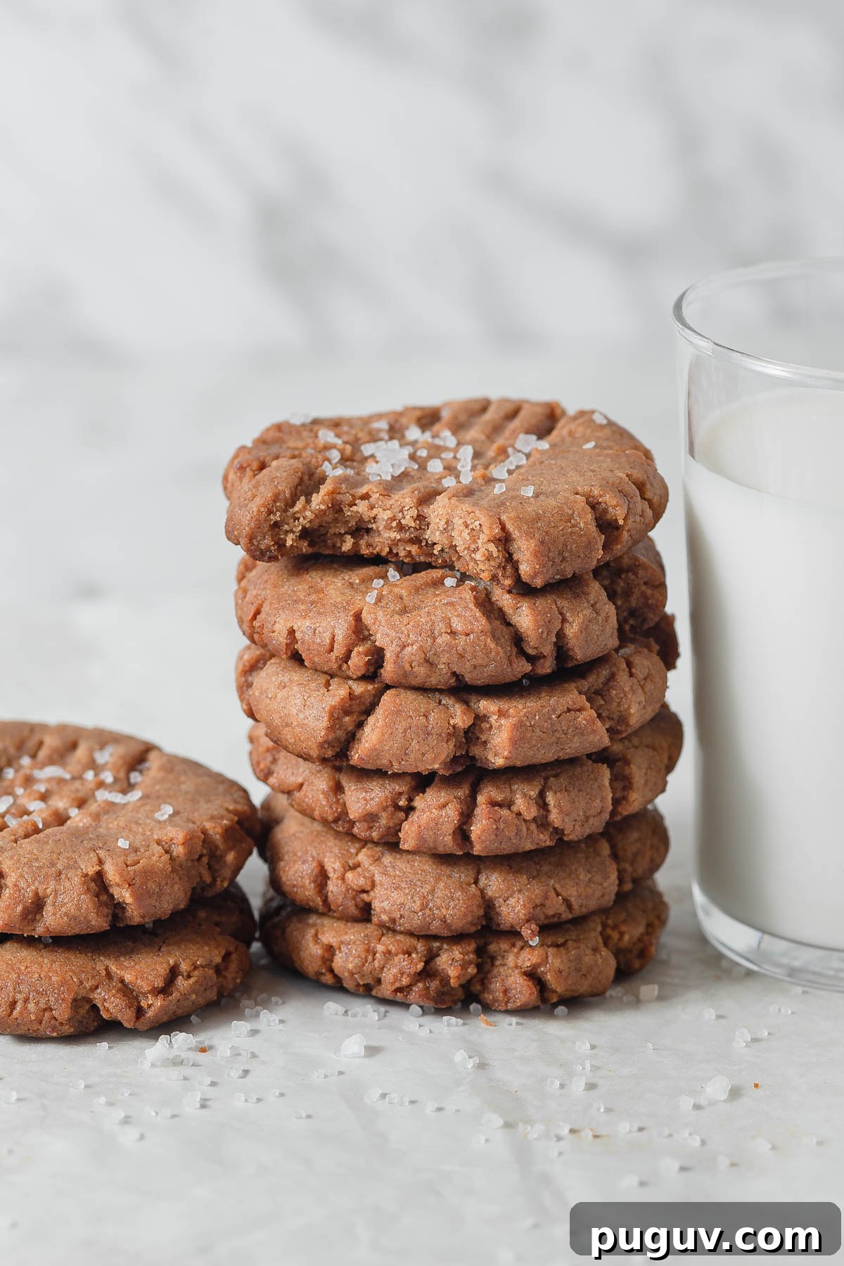Keto Peanut Butter Cookies – 4-Ingredient Low-Carb Recipe 6 keto peanut butter cookies with a glass of milk