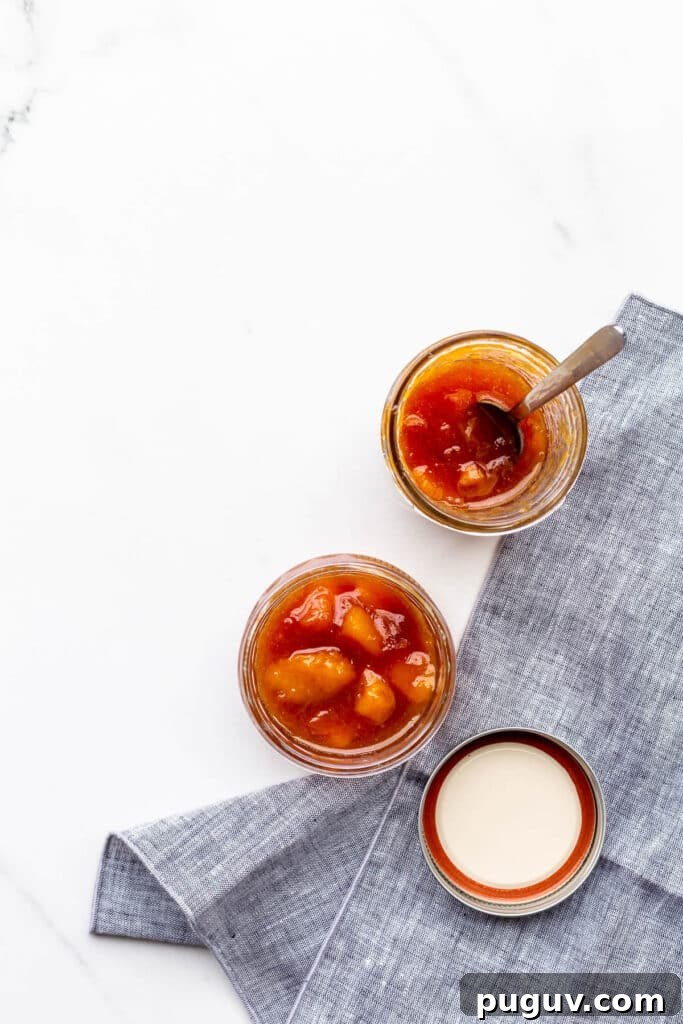 Jars of homemade peach jam.