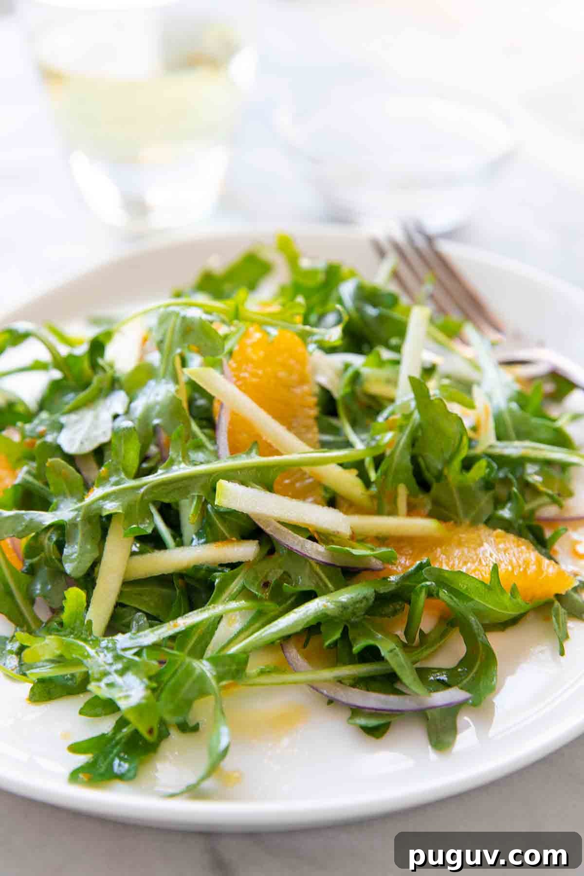 A plate of apple, fennel, and orange salad
