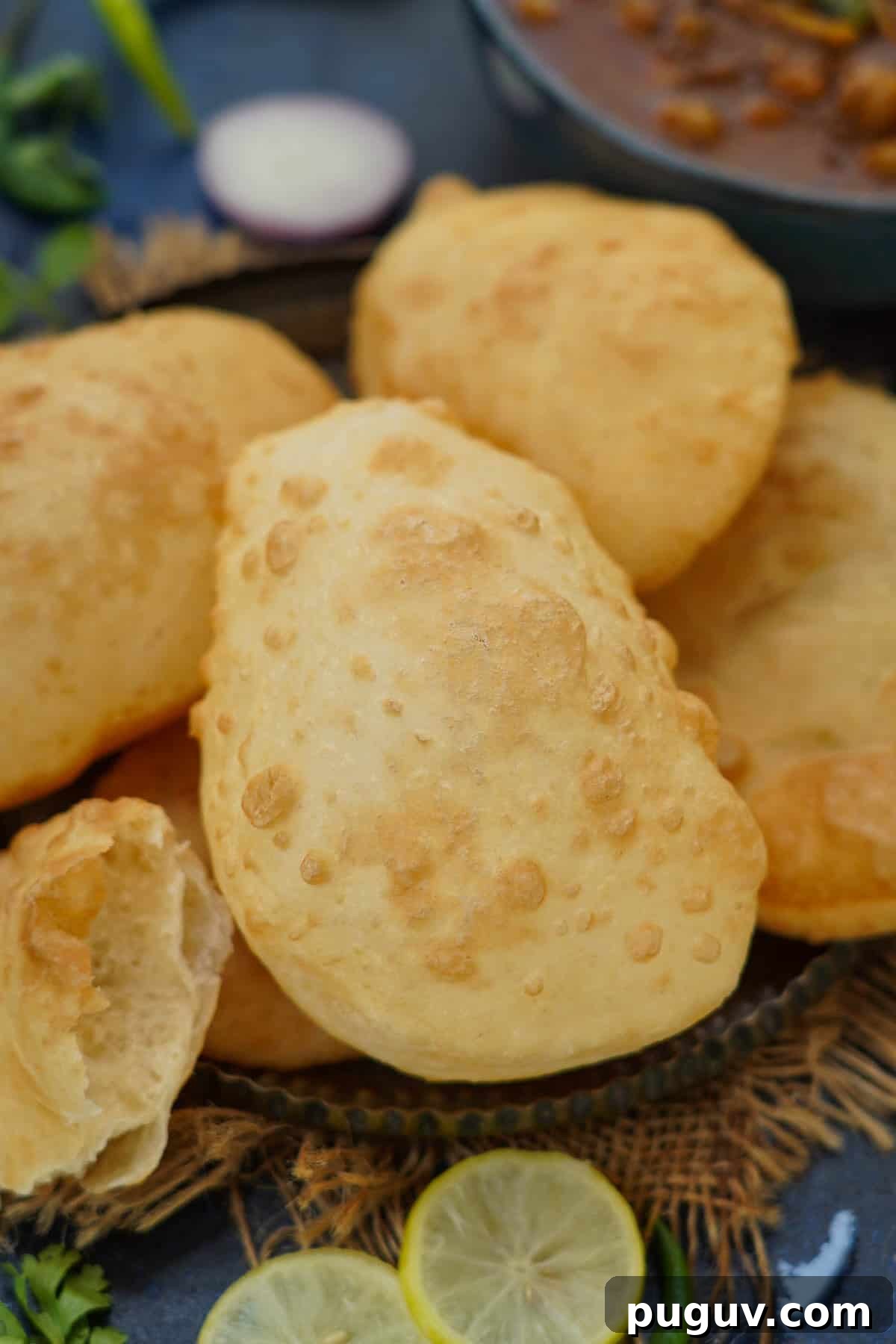 Punjabi bhatura served on a plate.