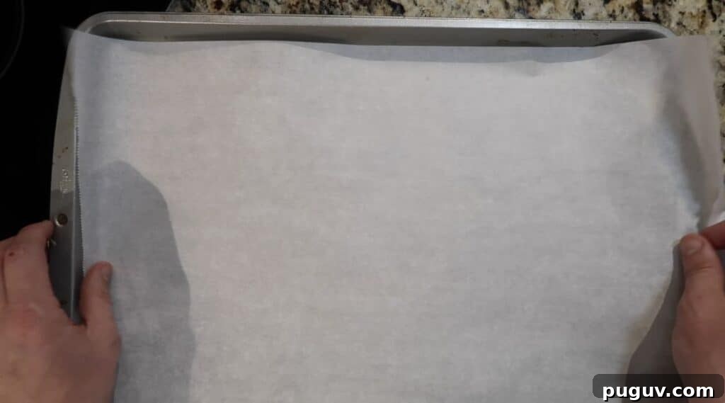 Baking sheet lined with parchment paper
