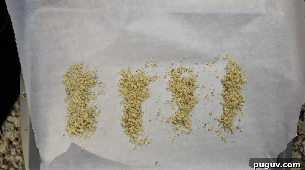 Breadcrumbs on baking sheet