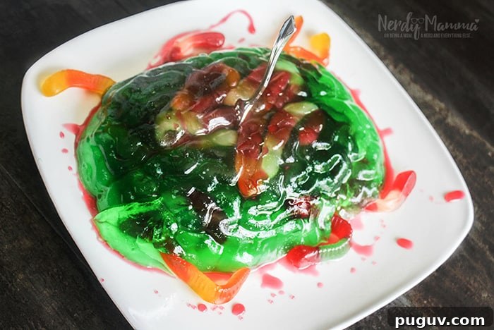 Calling all Jello fans! I've got the perfect Halloween treat for you: zombie brain jello dessert.