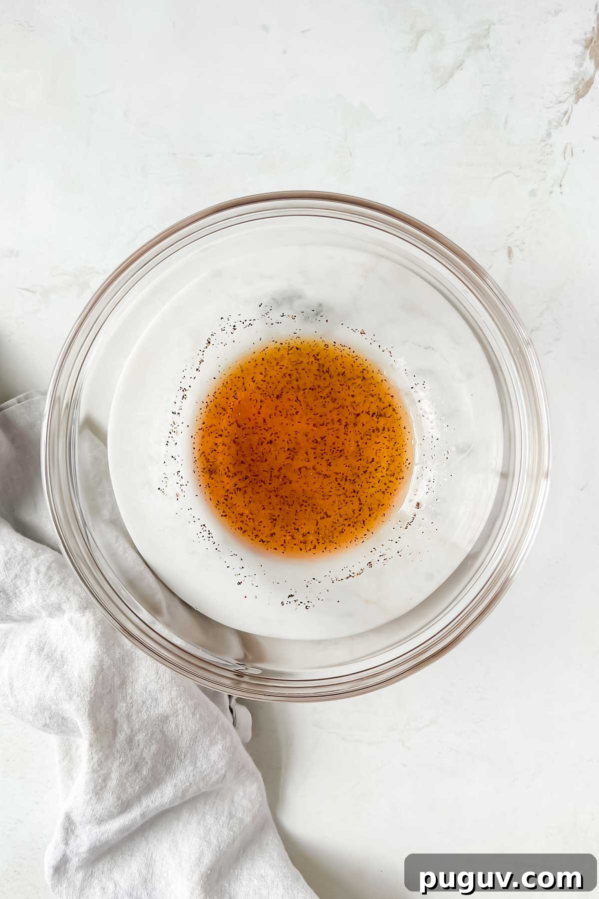 Tangy Tomato Relish Recipe for Sandwiches, Burgers & Tapas 4 tomato relish dressing in clear glass mixing bowl.