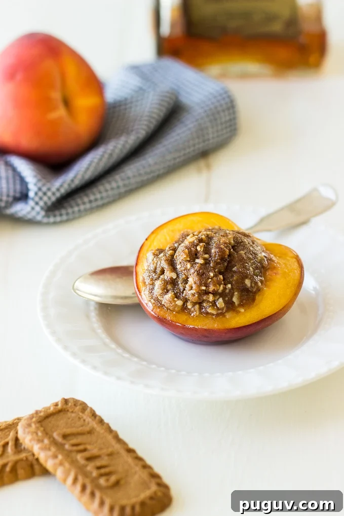 Amaretto-Stuffed Peaches with Almond & Biscoff Cookie Crumble 2 Almond-Biscoff-Cookie-Stuffed-Peaches-Amaretto.jpg