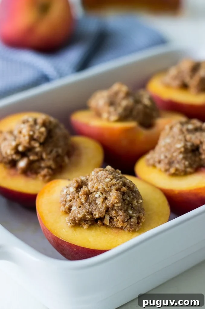 Amaretto-Stuffed Peaches with Almond & Biscoff Cookie Crumble 3 Almond-Biscoff-Cookie-Stuffed-Peaches-Amaretto.jpg