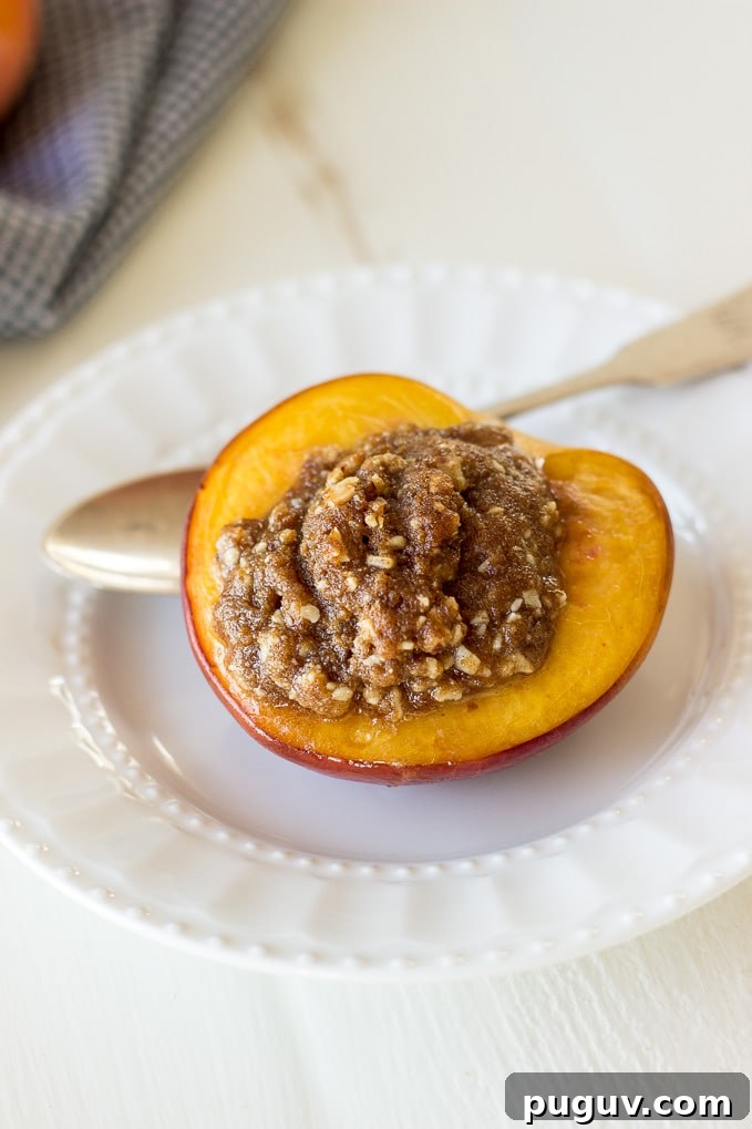 Amaretto-Stuffed Peaches with Almond & Biscoff Cookie Crumble 5 Almond-Biscoff-Cookie-Stuffed-Peaches-Amaretto.jpg