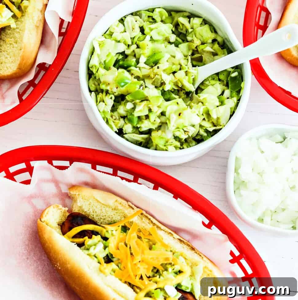 A small white bowl with homemade relish in to top hot dogs in paper lined baskets.