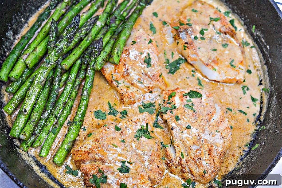 Creamy Cajun Cod Skillet with Asparagus (Keto-Friendly) 6 Creamy Keto Skillet Cajun Cod With Asparagus