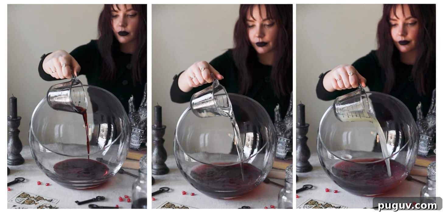 Three images making witches brew cocktail punch. In photo 1, a woman dressed as a witch is pouring blueberry liqueur into a punch bowl on a white counter next to black candles, Halloween decorations, and tarot cards. In photo 2, she's adding tequila to the bowl. In photo 3, she's adding lemon juice.