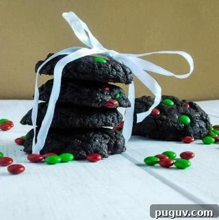 gluten free chocolate cake cookies wrapped in a ribbon on a white board