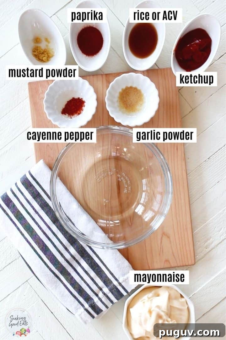 Creamy Yum Yum Sauce Recipe: Simple Homemade Japanese Steakhouse Sauce 3 Ingredients needed for making yum yum sauce sitting on a white board