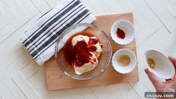 Creamy Yum Yum Sauce Recipe: Simple Homemade Japanese Steakhouse Sauce 4 Adding the yum yum sauce ingredients to a clear glass bowl