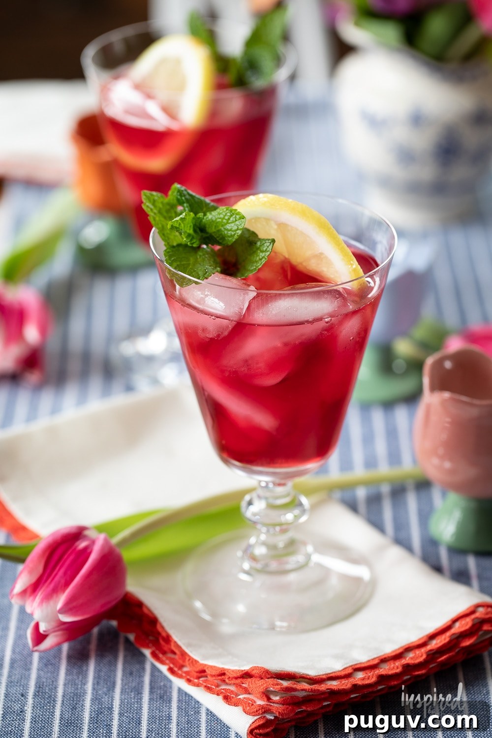 Pink Tulip Cocktail Recipe: Floral Vodka Drink Guide 5 pink tulip cocktail served with lemon and mint garnish.