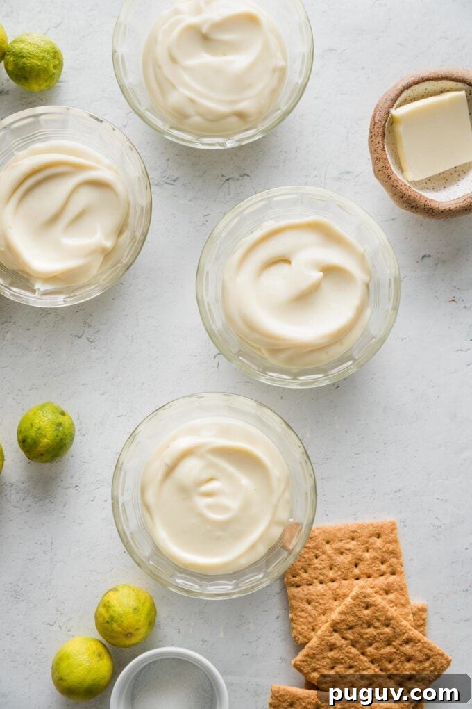 Small custard dishes filled with a no bake key lime pie filling.