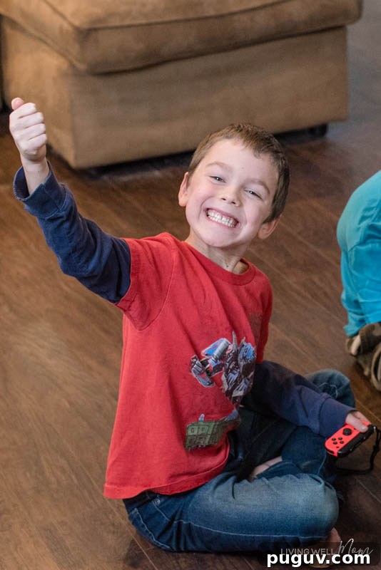 How a Gaming Console Can Bring Your Family Together 12 A little boy giving the thumbs up