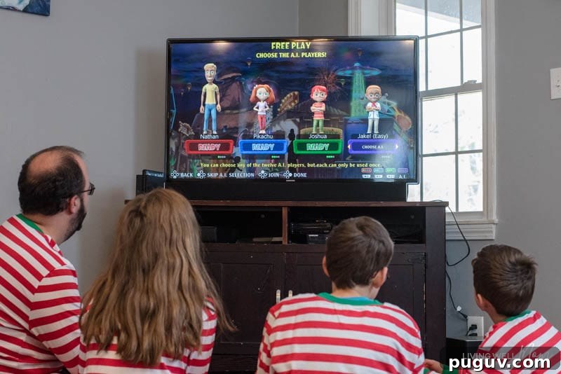 How a Gaming Console Can Bring Your Family Together 10 A group of people sitting in front of a television playing a Carnival game