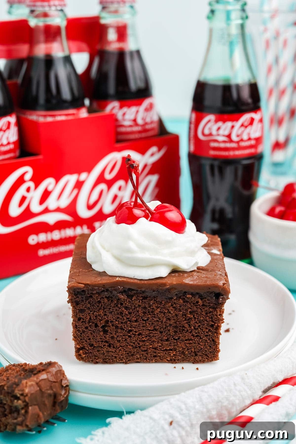 Copycat Cracker Barrel Coca-Cola Cake Recipe You’ll Love 2 Slice of Cracker Barrel coca cola cake recipe on a plate.