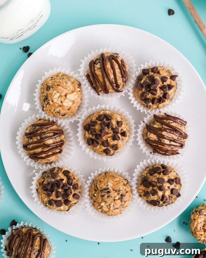 Peanut butter protein balls served up on a white plate.