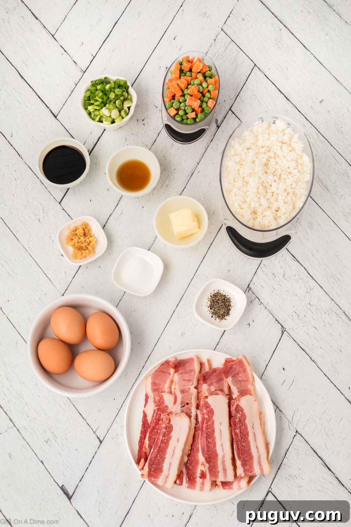 Ingredients - Bacon, eggs, salt, pepper, butter, minced garlic, rice, soy sauce, sesame oil, frozen peas and carrots, and green onions