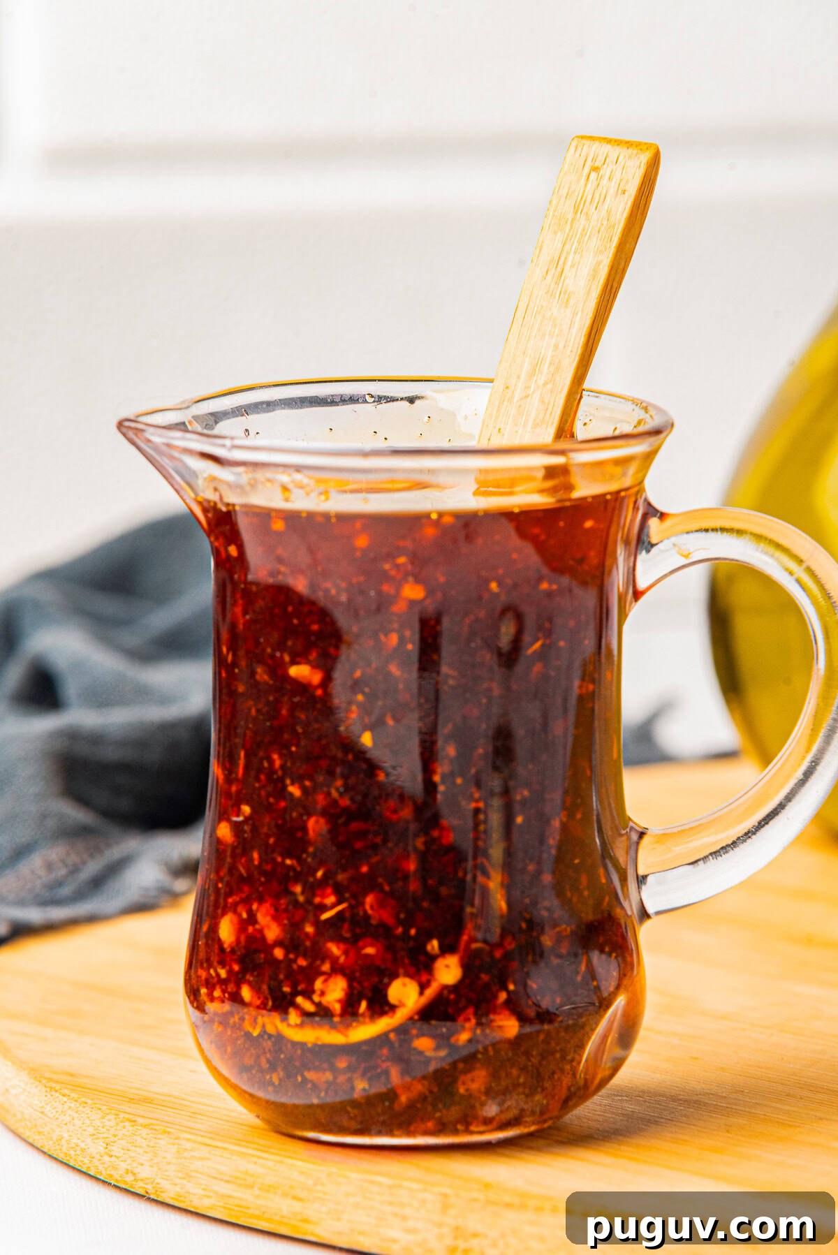 Homemade Chili Oil Recipe: Step-by-Step Guide for Authentic Flavor 2 straight on image of Chili Oil in a glass jar
