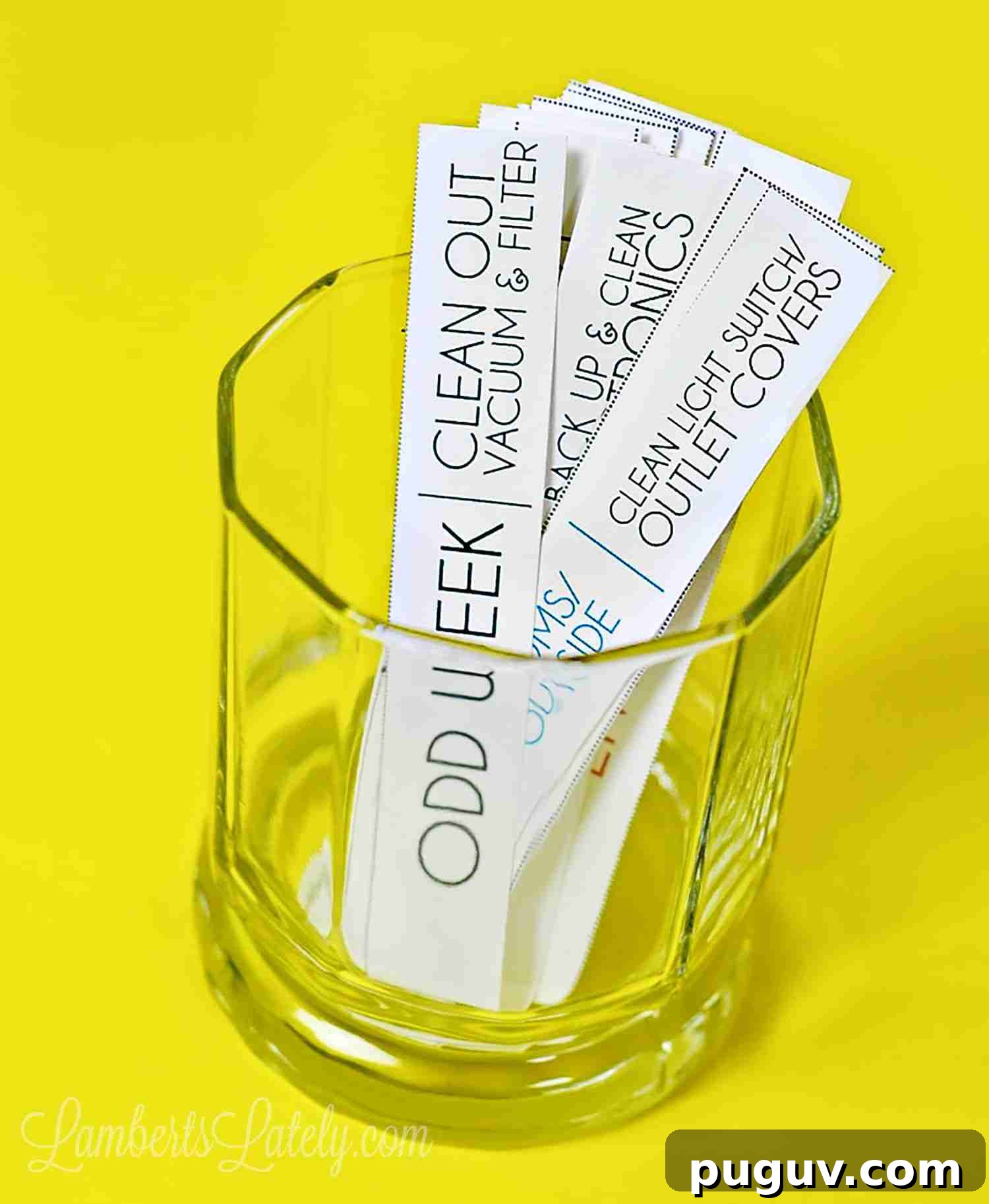 chore cards in a glass with yellow background
