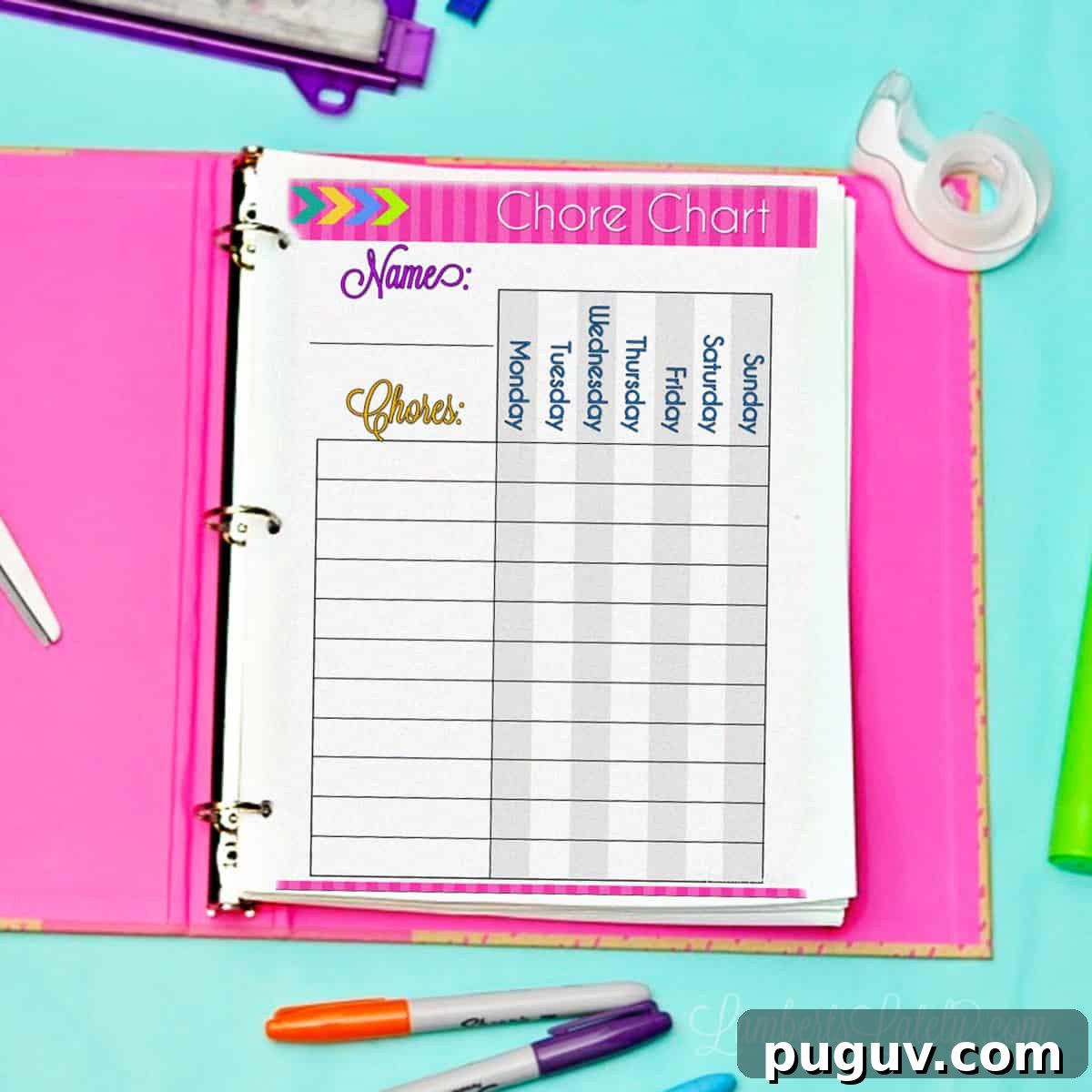 chore chart printable in a notebook on a desk.